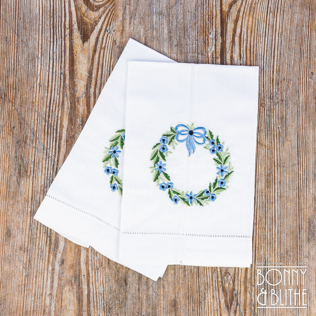 Pair of Embroidered Table Napkins | Blue Floral Ribbon Wreath