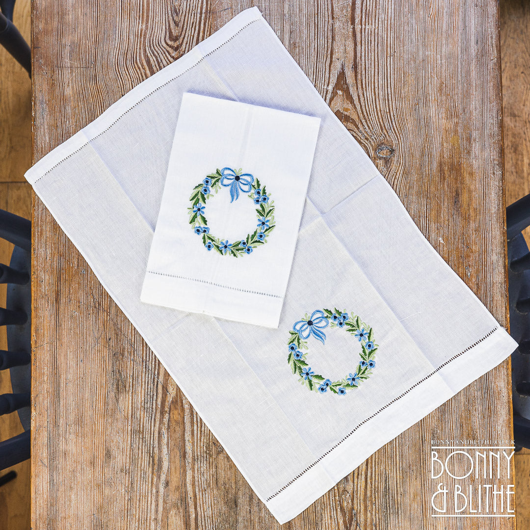 Pair of Embroidered Table Napkins | Blue Floral Ribbon Wreath