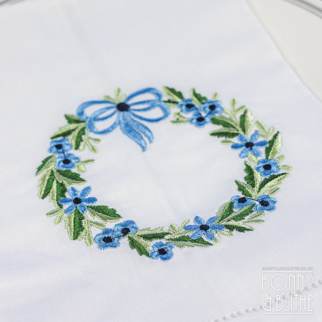 Pair of Embroidered Table Napkins | Blue Floral Ribbon Wreath