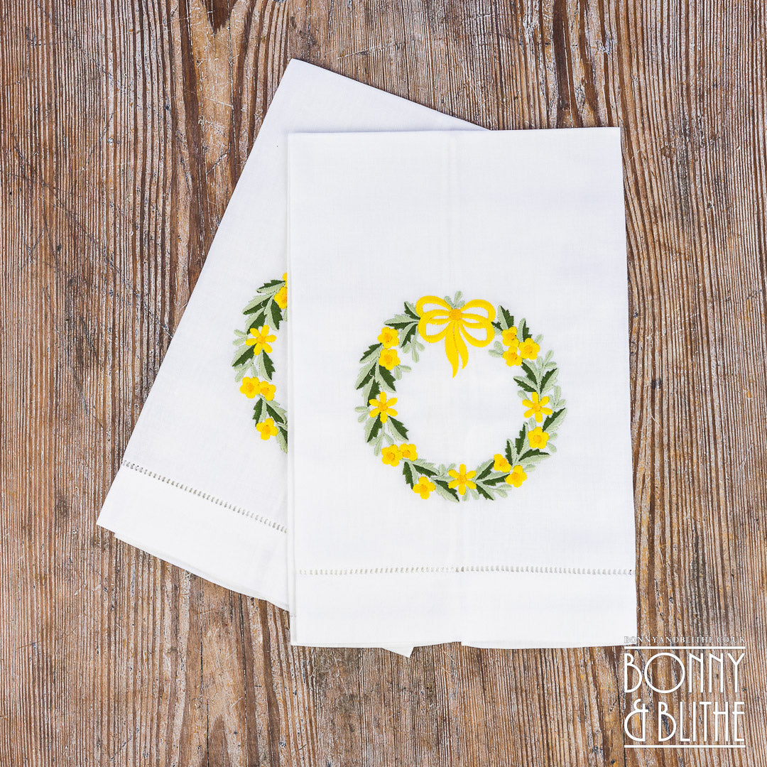 Pair of Embroidered Table Napkins | Yellow Floral Ribbon Wreath