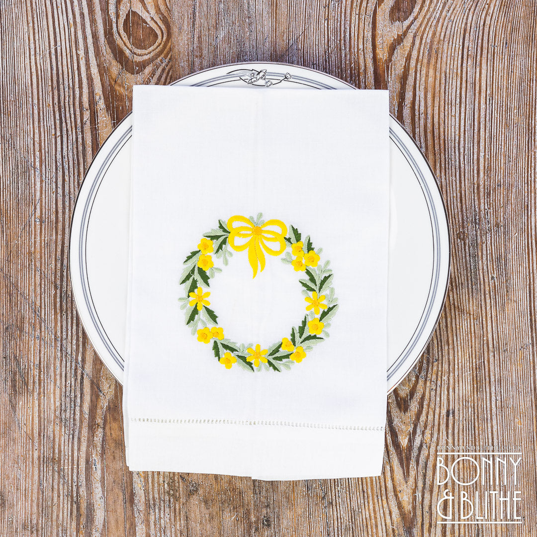 Pair of Embroidered Table Napkins | Yellow Floral Ribbon Wreath