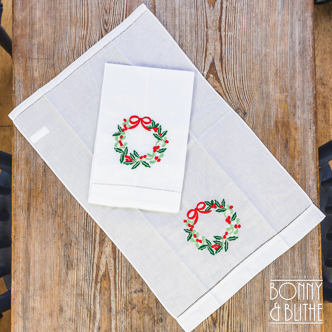 Pair of Embroidered Table Napkins | Holly Red Ribbon Wreath