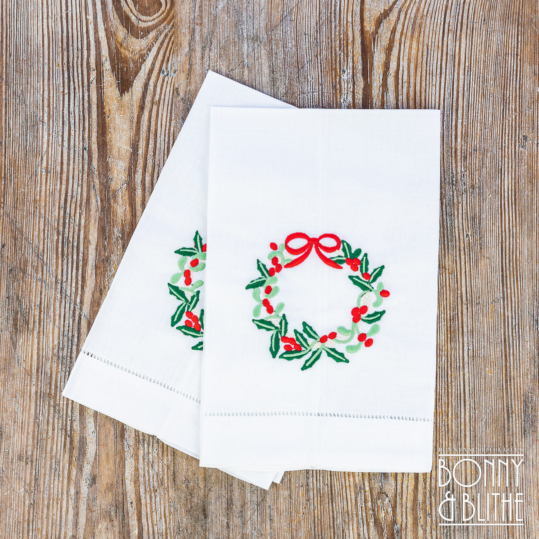 Pair of Embroidered Table Napkins | Holly Red Ribbon Wreath
