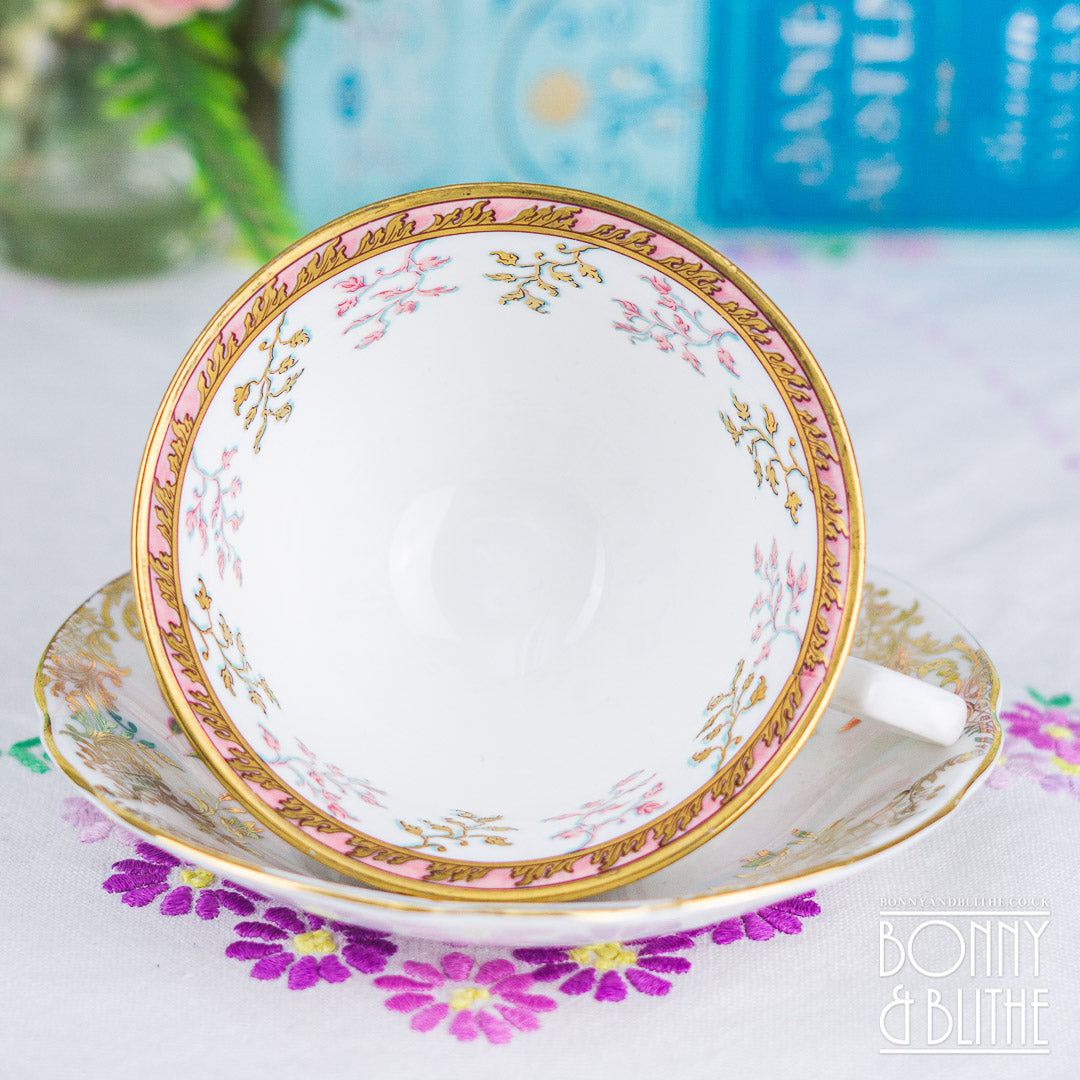 Royal Crest Mismatch Teacup and Saucer