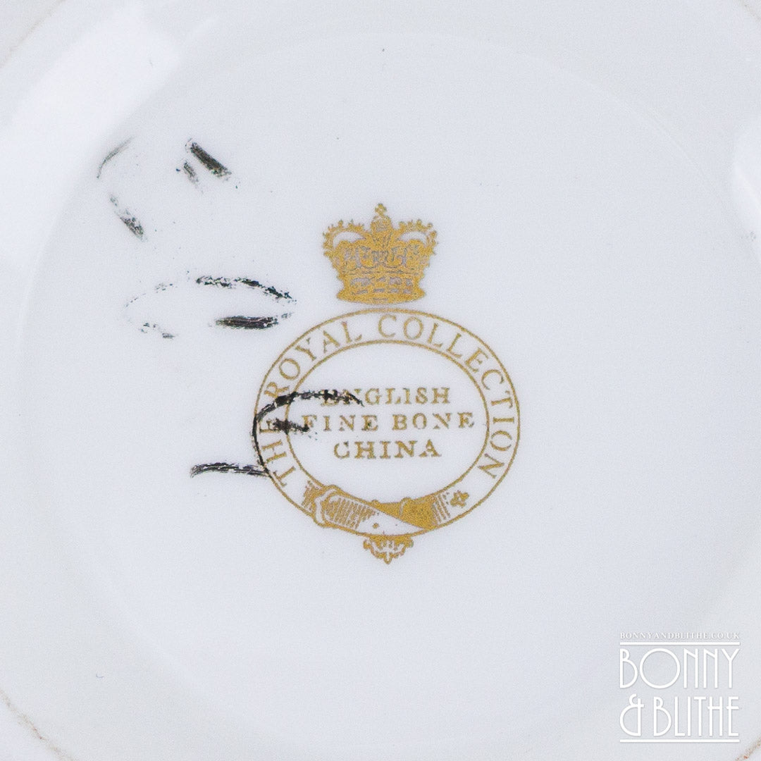 Royal Crest Mismatch Teacup and Saucer